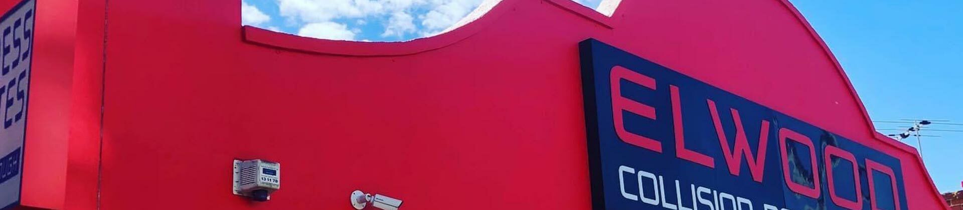 infill-clad-rendered-facade-in-red-by-chad-banner
